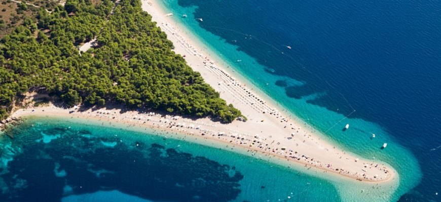 Aerial photograph of famous Zlatni Rat beach in Bol, Brac Island